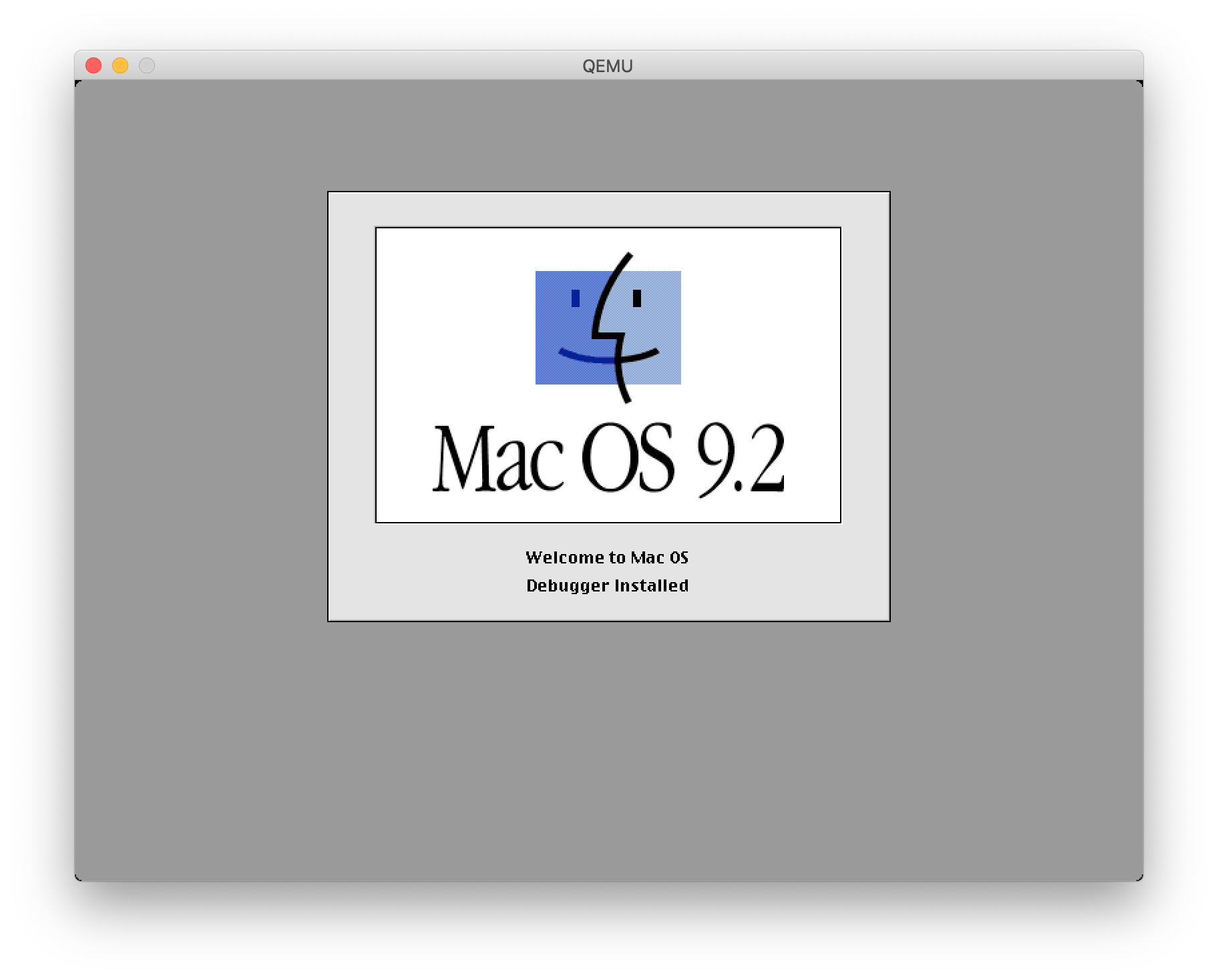 Mac OS boot screen in QEMU, showing that the debugger has been installed